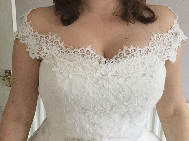 lacy off the shoulder feature for a strapless gown 